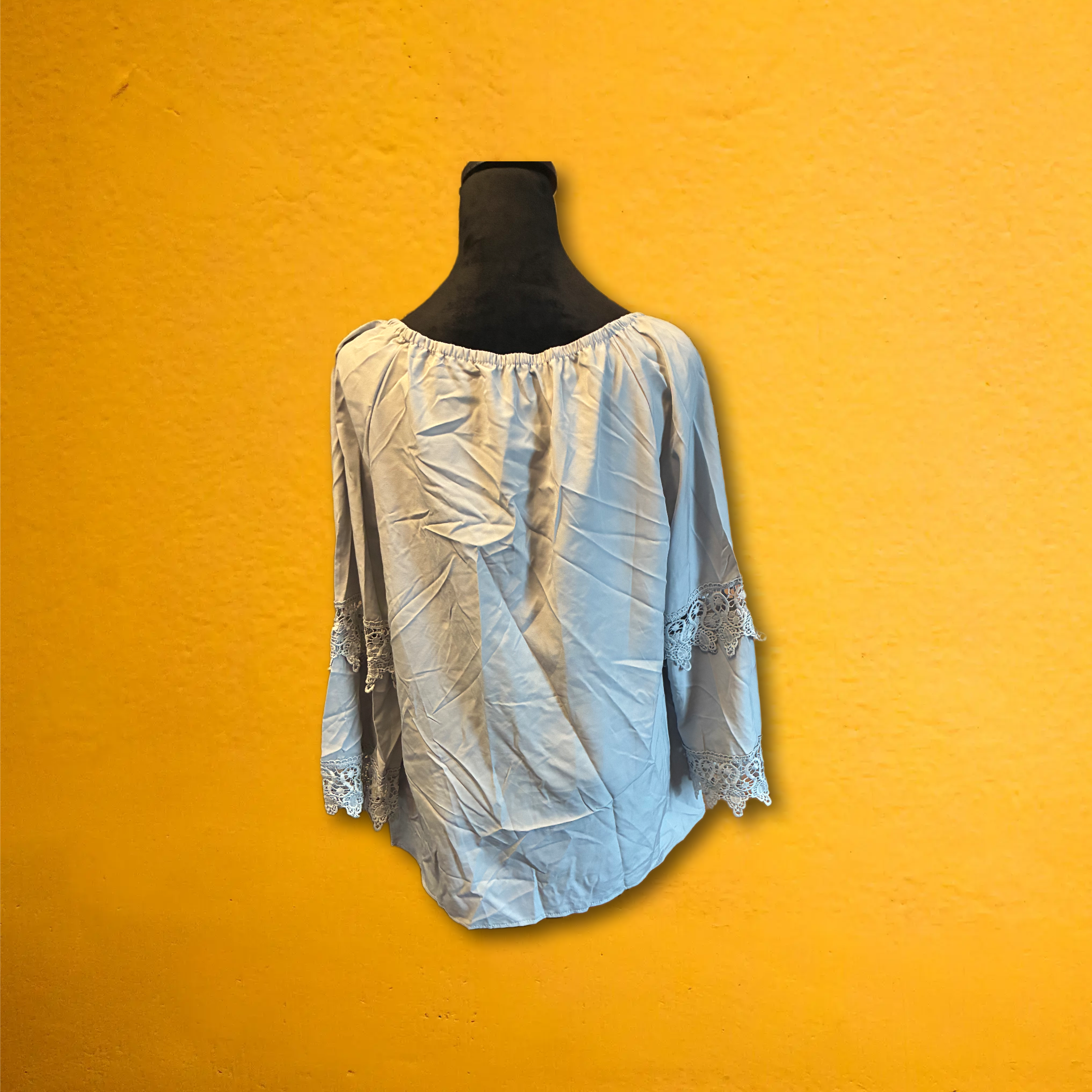 Woman’s long sleeve top